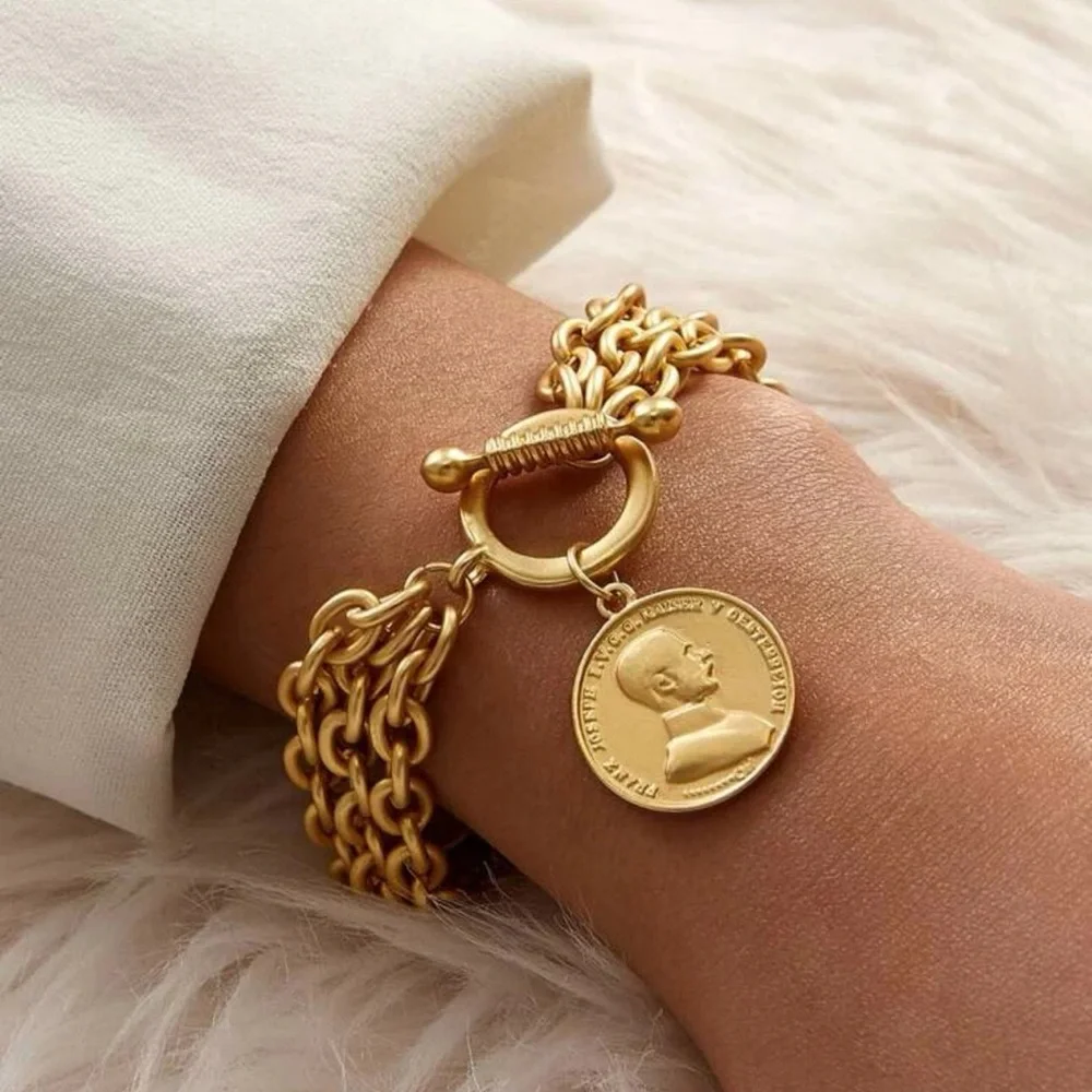 Gold Colored Chain Bracelet with Coin Pendant